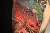  红鲤鱼纹身图案与手稿欣赏，寓意吉祥的经典传统